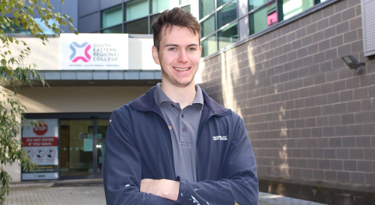 Picture of smiling student outside building